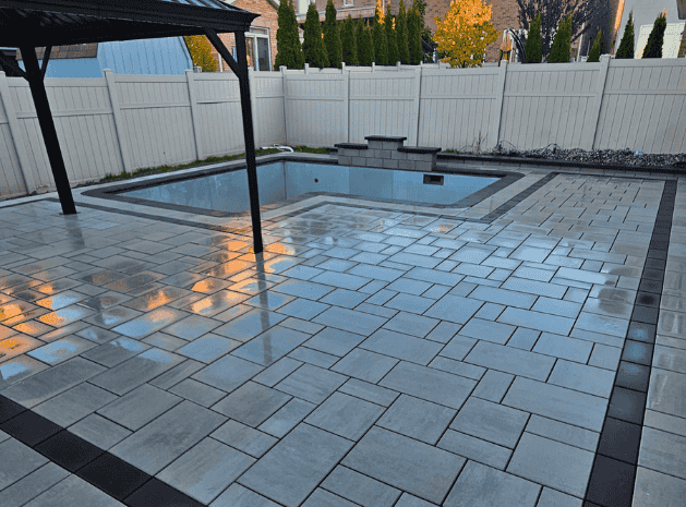 interlocking patio and pool installation
